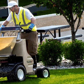 D & E Landscaping & Grading - a man using a lawn sweepr - Snow Removal Near Me - Richmond, Michigan D & E Landscaping & Grading - a man using a lawn sweepr - Snow Removal Near Me - Richmond, Michigan