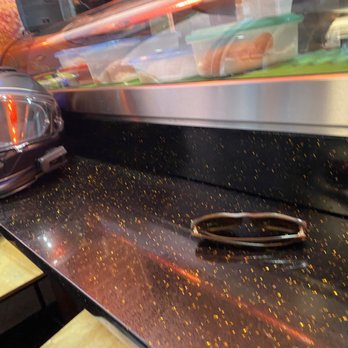 Tokyo Noodle Shop - a helmet on a counter - Sushi Bars Near Me - Edmonton, Alberta Tokyo Noodle Shop - a helmet on a counter - Sushi Bars Near Me - Edmonton, Alberta