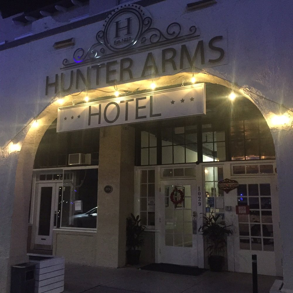 Front of hotel at night which may look small but the ceilings are very high!