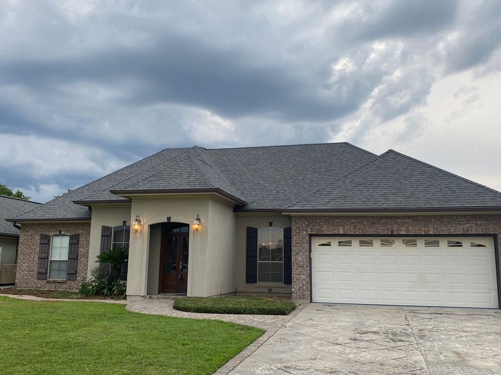 Slide of Pelican Roofing