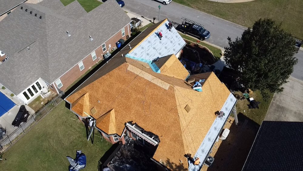 Slide of Quest Roofing & Exteriors