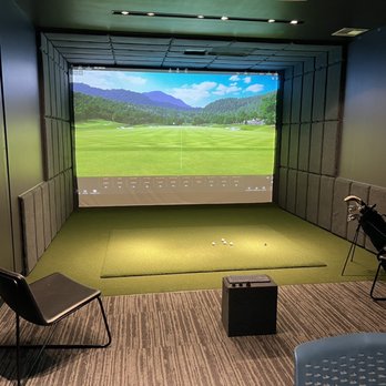 Golfinity - VIP Room with two bays and table. - Golf Lessons Near Me - Austin, Texas