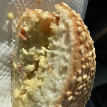 Grounds Bakery Cafe - This is a cross section of the bagel with jalapeño cream cheese. Not really cream cheese. - Bakeries Near Me - Long Beach, California Grounds Bakery Cafe - This is a cross section of the bagel with jalapeño cream cheese. Not really cream cheese. - Bakeries Near Me - Long Beach, California