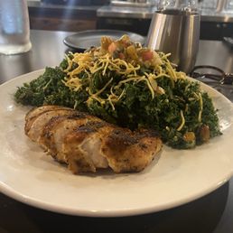 Kale and apple salad with blackened chicken