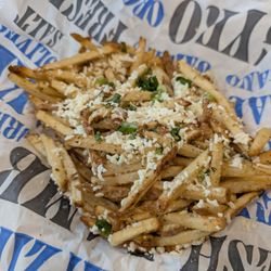 Nick The Greek - Greek fries with feta, lemon, and dill