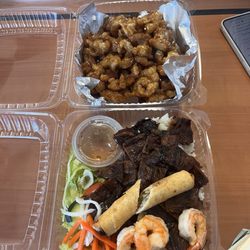 Bbq pork and shrimp combo with orange chicken.