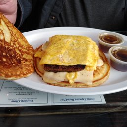 Salt Water Cowboy. Choice of meats, egg and cheese inside two pancakes. Salt Water Cowboy. Choice of meats, egg and cheese inside two pancakes.
