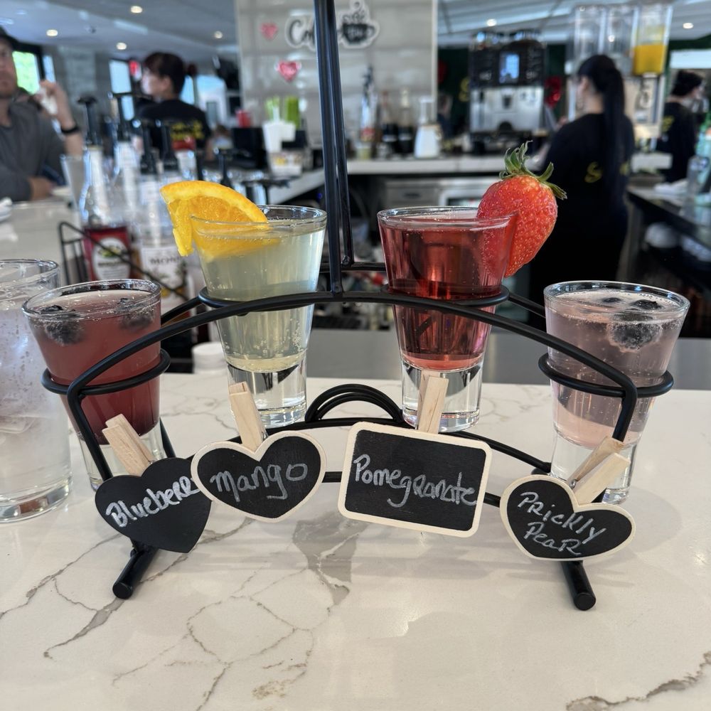 Sunshine Breakfast Bar - Mimosas (Blueberry, Mango, Pomegranate, Prickly Pear - Breakfast & Brunch Near Me - Tempe, Arizona Sunshine Breakfast Bar - Mimosas (Blueberry, Mango, Pomegranate, Prickly Pear - Breakfast & Brunch Near Me - Tempe, Arizona
