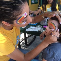 Kallpachay Spanish Immersion - Face painting during Fiesta Day.