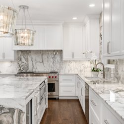 Armina Stone - Calacatta Vagli marble countertops and full-height backsplash by Armina Stone.