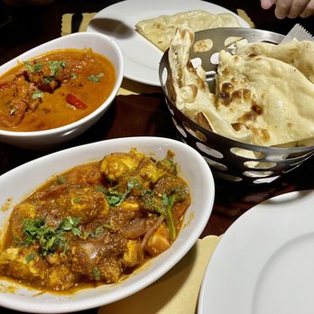 India's Grill Brandon - C26. Kadai Chicken Curry, C21. Butter Chicken, and B1. Plain Naan - Indian Near Me - Brandon, Florida India's Grill Brandon - C26. Kadai Chicken Curry, C21. Butter Chicken, and B1. Plain Naan - Indian Near Me - Brandon, Florida