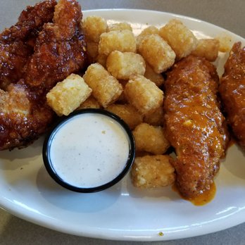 Pluckers Wing Bar - Webster - Spicy Garlic Parmesan, Tator Tots, Gochujang boneless wings basket - Chicken Wings Near Me - Webster, Texas