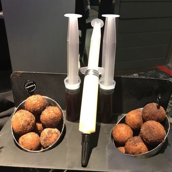 Topgolf - You inject your own donut holes. Super fun and yummy. - New American Near Me - Austin, Texas Topgolf - You inject your own donut holes. Super fun and yummy. - New American Near Me - Austin, Texas