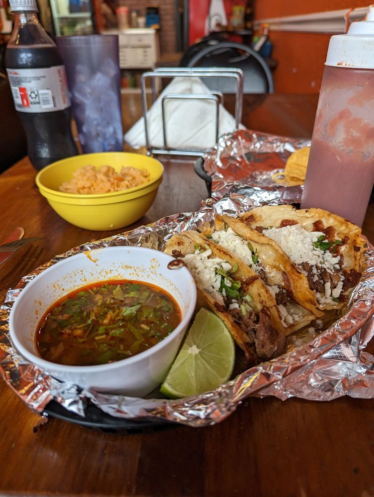 Taqueria El Mariachi Logo
