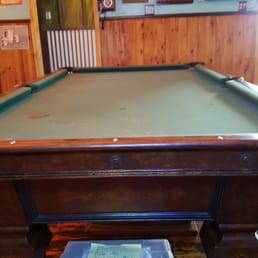 This is the famous pool table that was purchased in 1903 for the bar and is still in use today.