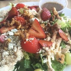 Overseas Pub and Grill - Strawberry mixed green salad with chicken, blue cheese, candied walnuts with balsamic reduction