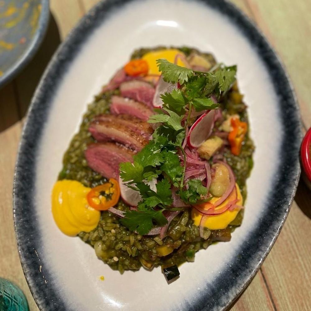 Yakumanka - This arroz con pato blew us away with how good it was! - Peruvian Near Me - Barcelona, B