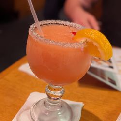 Texas Roadhouse - Hurricane Margarita (mix of rum, tequila, orange juice, pineapple juice, and grenadine.)