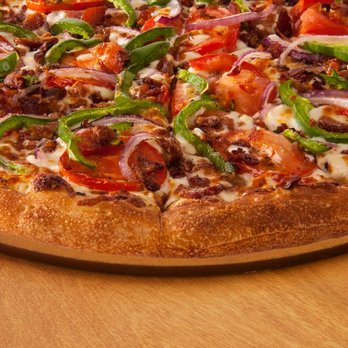 Snappy Tomato Pizza - a closeup of a pizza - Pizza Near Me - Mayfield, Kentucky Snappy Tomato Pizza - a closeup of a pizza - Pizza Near Me - Mayfield, Kentucky