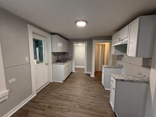 Blue Hammer Construction Logo