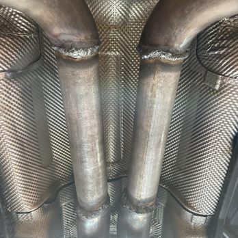 Mobile Mufflers - Result of this business's work. Note the heat damage to the surrounding area, poor quality of exhaust piping, and poor welds. - Auto Repair Near Me Mobile Mufflers - Result of this business's work. Note the heat damage to the surrounding area, poor quality of exhaust piping, and poor welds. - Auto Repair Near Me