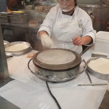 99 Ranch Market - making Chinese crepes for a kind of burrito full of meat and pickles. - Seafood Markets Near Me - Arcadia, California 99 Ranch Market - making Chinese crepes for a kind of burrito full of meat and pickles. - Seafood Markets Near Me - Arcadia, California