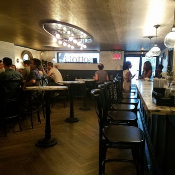 Via 13 - the immediate entrance area of the restaurant with bar seating - Italian Near Me - New York, New York Via 13 - the immediate entrance area of the restaurant with bar seating - Italian Near Me - New York, New York