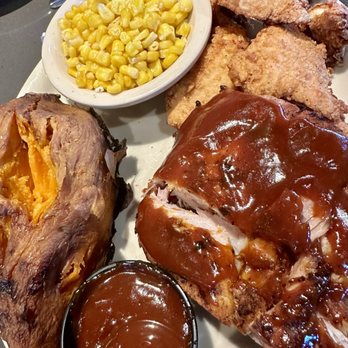 Logan's Roadhouse - Ribs and chicken tenders plate with corn and sweet potato - Barbeque Near Me - Ft. Myers, Florida Logan's Roadhouse - Ribs and chicken tenders plate with corn and sweet potato - Barbeque Near Me - Ft. Myers, Florida