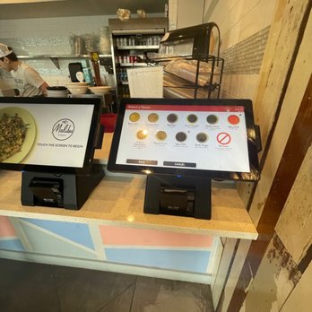 Malibu Poke - a counter with a menu on it - Poke Near Me - Dallas, Texas Malibu Poke - a counter with a menu on it - Poke Near Me - Dallas, Texas