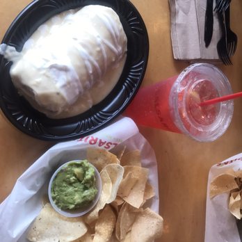 Salsarita's - a plate of nachos, chips and guacamole - Tex-Mex Near Me - West Columbia, South Carolina Salsarita's - a plate of nachos, chips and guacamole - Tex-Mex Near Me - West Columbia, South Carolina
