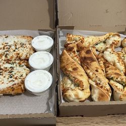 Salinas Pizza House - Left: Cheesy Garlic Bread (and cheesy it was) Right: Garlic Parmesan Twist