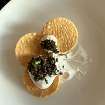 Rock & Hawk Sports Bar and Grill - Caviar and potatoe chips fillies in beef fallow with an herb sour cream - Sports Bars Near Me - Lawrence, Kansas Rock & Hawk Sports Bar and Grill - Caviar and potatoe chips fillies in beef fallow with an herb sour cream - Sports Bars Near Me - Lawrence, Kansas