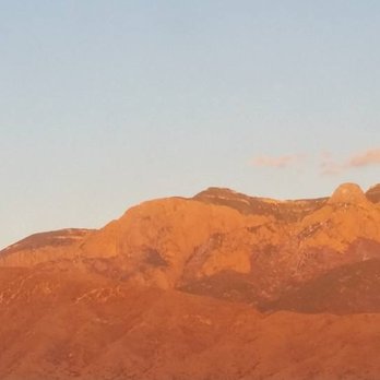 Bien Shur - The Sandias look gorgeous at sunset.  View from Bien Shur. - New American Near Me - Albuquerque, New Mexico