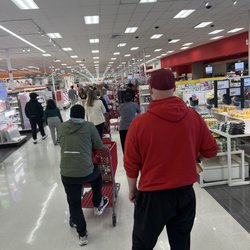 Always a wait in line to check out even with self-check