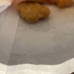 McDonald's - My mom got 4 piece nuggets in they were rotien