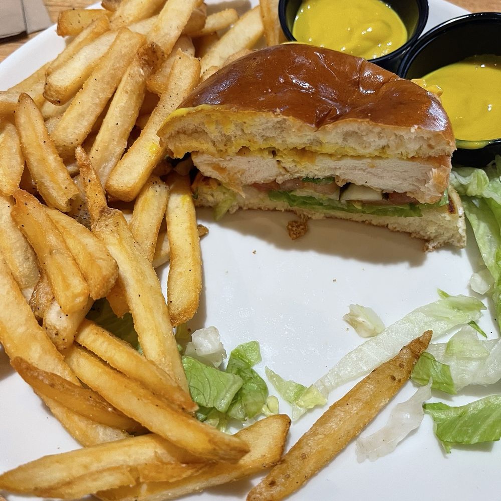 Applebee's Grill + Bar - Half of the new chicken sandwich special with fries.  The other half went home. - American Near Me - Terrell, Texas