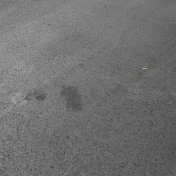 Opal Construction - Huge boot print left in the middle of my driveway by opal - General Contractors Near Me - Bay Shore, New York