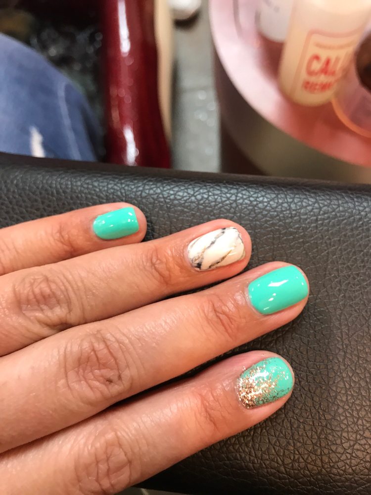 Couture Nails by Nancy Logo