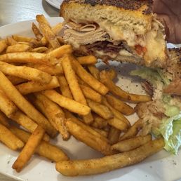 TBT melt. Turkey , bacon, tomato , provolone cheese on garlic bread . Spicy fries !!!! You must try TBT melt. Turkey , bacon, tomato , provolone cheese on garlic bread . Spicy fries !!!! You must try