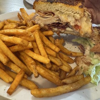 Tnt's Cafe - TBT melt. Turkey , bacon, tomato , provolone cheese on garlic bread . Spicy fries !!!! You must try - Breakfast & Brunch Near Me - Hesperia, California Tnt's Cafe - TBT melt. Turkey , bacon, tomato , provolone cheese on garlic bread . Spicy fries !!!! You must try - Breakfast & Brunch Near Me - Hesperia, California