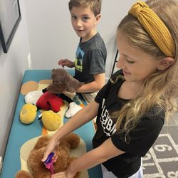 Rubinstein Family Chiropractic - They have an area for kids to play and practice doing "adjustments"