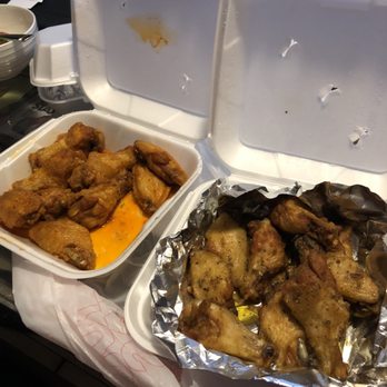Lakeshore Pizza - On the left- medium chicken wings On the right- garlic chicken wings - Pizza Near Me - Cicero, New York Lakeshore Pizza - On the left- medium chicken wings On the right- garlic chicken wings - Pizza Near Me - Cicero, New York