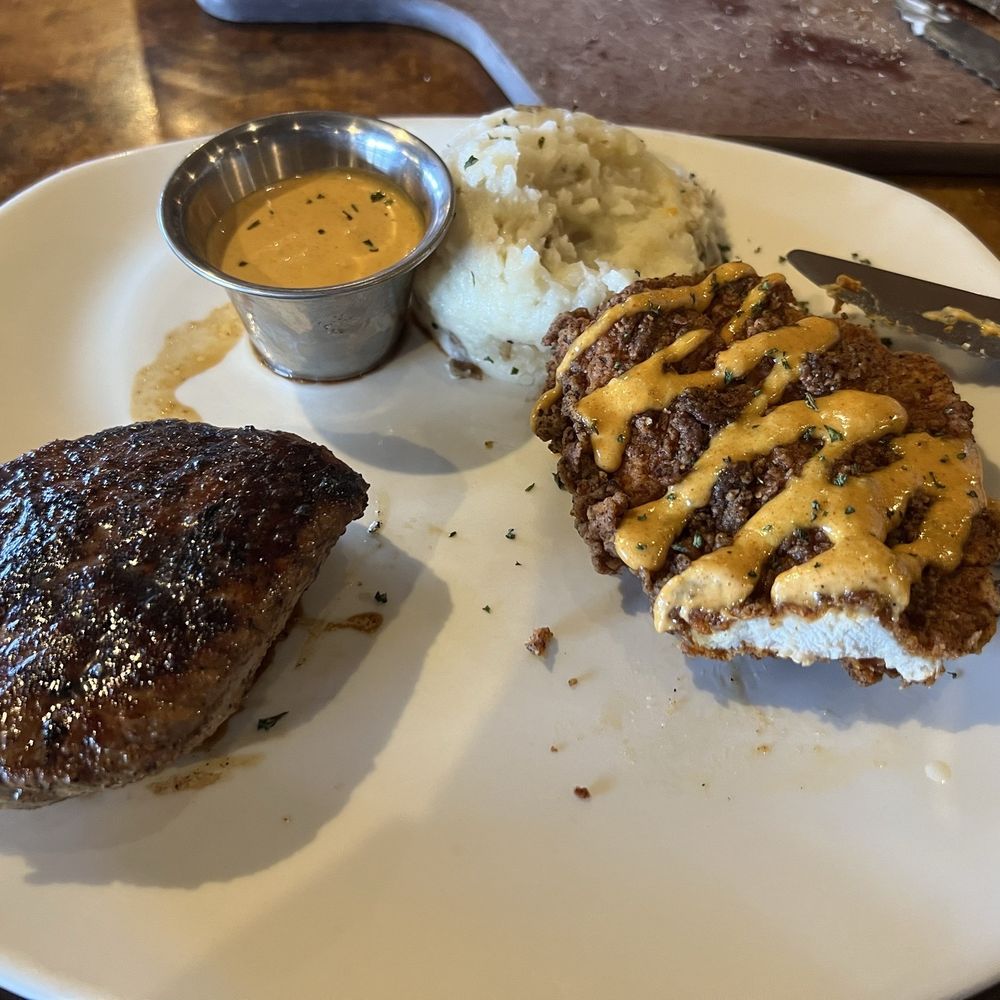 6oz sirloin & Bloomin' Fried Chicken with Homestyle Mashed Potatoes. That bloomin' sauce was delicious! 6oz sirloin & Bloomin' Fried Chicken with Homestyle Mashed Potatoes. That bloomin' sauce was delicious!