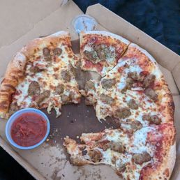 Very doughy and under cooked Pizza