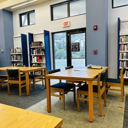 Panama City Beach Public Library - Study Tables & Chairs with Outlets on the floor nearby