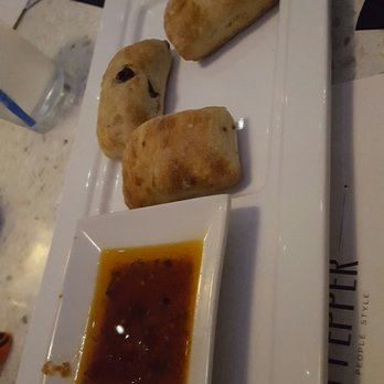 The Sacred Pepper - Olive bread and sun-dried tomato herb oil - New American Near Me - Tampa, Florida The Sacred Pepper - Olive bread and sun-dried tomato herb oil - New American Near Me - Tampa, Florida
