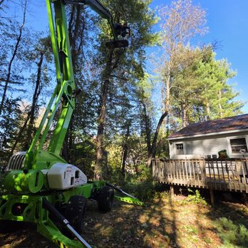 Good N U Dirt Works - Taking trees down over hanging a customer's house. - Excavation Services Near Me - Belmont, New Hampshire Good N U Dirt Works - Taking trees down over hanging a customer's house. - Excavation Services Near Me - Belmont, New Hampshire