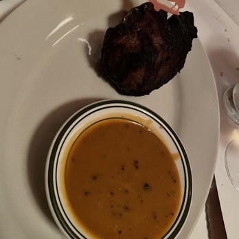 Wolfgang's Steakhouse - Filet Mignon with some type of sauce - Steakhouses Near Me - New York, New York Wolfgang's Steakhouse - Filet Mignon with some type of sauce - Steakhouses Near Me - New York, New York
