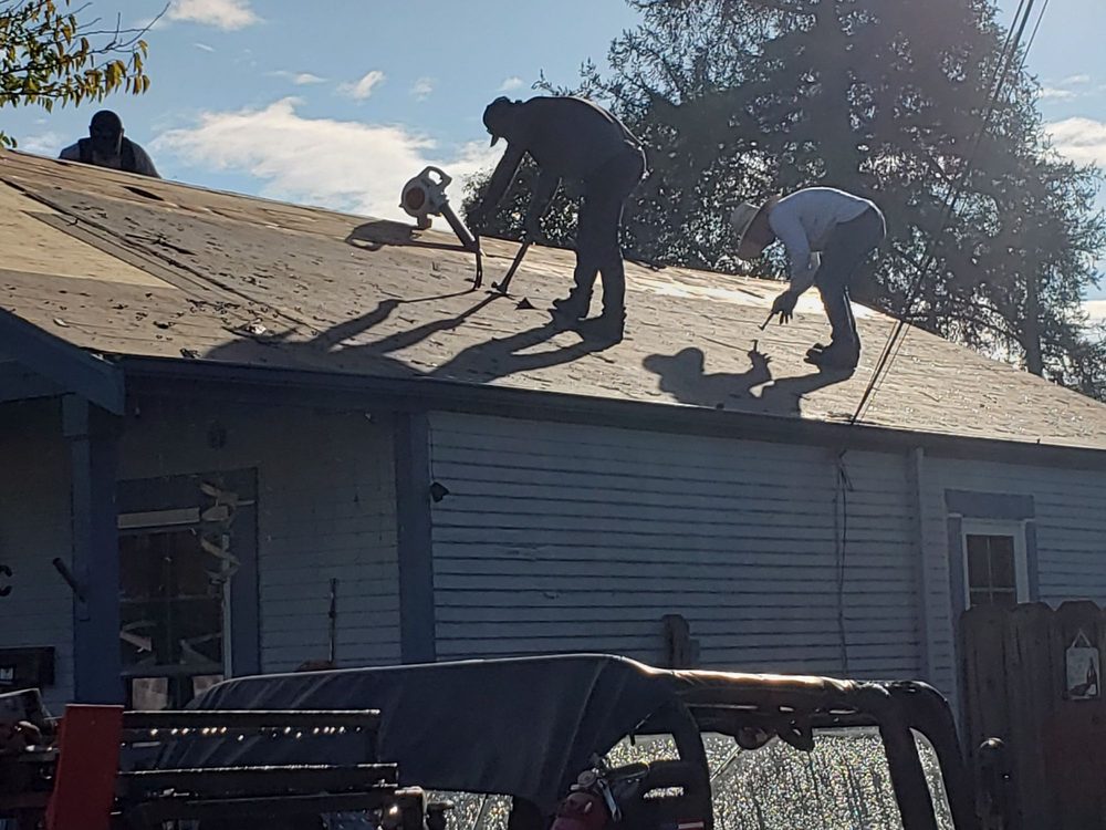 Slide of Henry Roofing