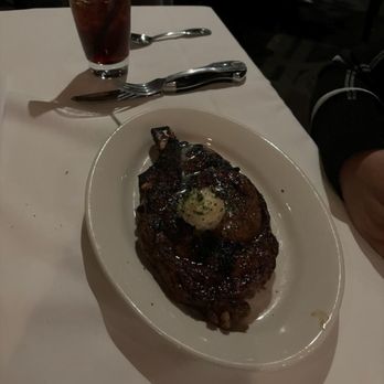 Morton's The Steakhouse - Prime bone-in rib eye with garlic butter - Steakhouses Near Me - Burbank, California Morton's The Steakhouse - Prime bone-in rib eye with garlic butter - Steakhouses Near Me - Burbank, California